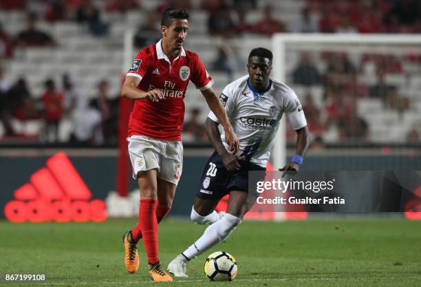 Benfica defender Andre Almeida from Portugal with CD Feirense forward Jose Valencia from Colombia in action during the Primeira Liga match between SL...