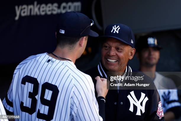 Tyler Wade of the New York Yankees fist bumps Reggie Jackson former New York Yankees prior to a game against the Toronto Blue Jays at Yankee Stadium...