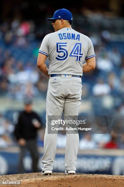 Roberto Osuna of the Toronto Blue Jays pitches against the New York Yankees during the ninth inning at Yankee Stadium on October 1, 2017 in the Bronx...