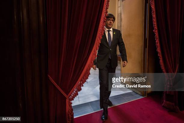 Catalan President Carles Puigdemont arrives at the Catalan Parliament on October 27, 2017 in Barcelona, Spain. MPs in the Catalan parliament have...