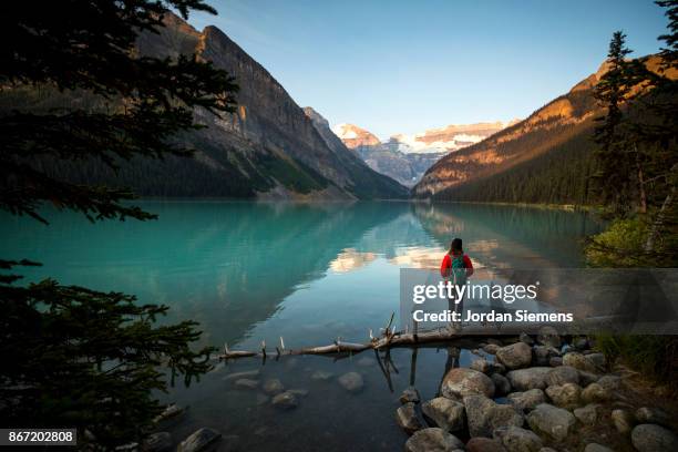 hiking at a scenic mountain lake - banff national park fotografías e imágenes de stock