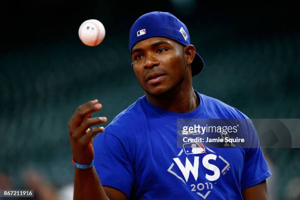 Yasiel Puig of the Los Angeles Dodgers warms up during batting practice before game three of the 2017 World Series against the Houston Astros at...