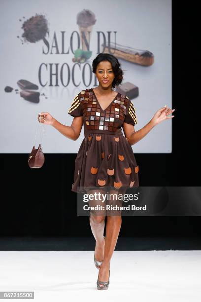 Hapsatou Sy walks the runway during the Dress Chocolate show as part of Salon du Chocolat at Parc des Expositions Porte de Versailles on October 27,...