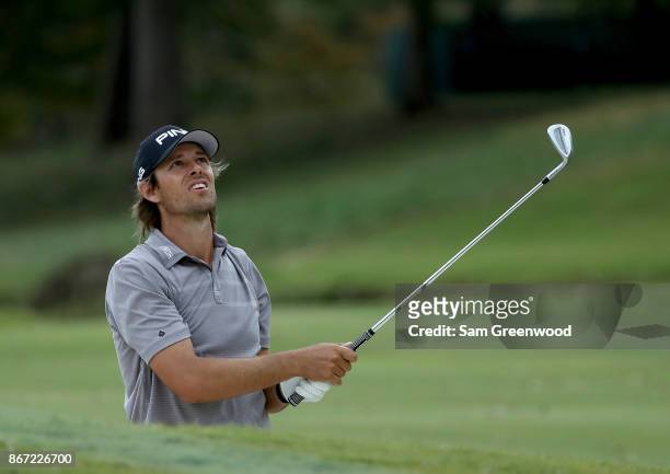 Aaron Baddeley of Australia plays a shot on the nineth hole during the second round of the Sanderson Farms Championship at the Country Club of...