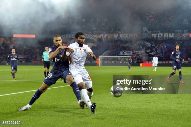 Kylian Mbappe of Paris Saint-Germain and Marlon Santos of OGC Nice fight for the ball during the Ligue 1 match between Paris Saint Germain and OGC...