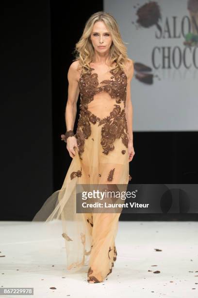 Actress Tonya Kinzinger walks the Runway during "Le Defile des Robes en Chocolats" during the "Salon du Chocolat Paris 2017" at Parc des Expositions...