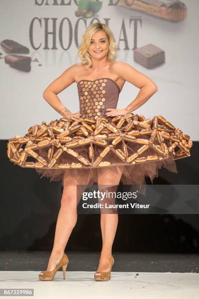 Singer Priscilla Betti walks the Runway during "Le Defile des Robes en Chocolats" during the "Salon du Chocolat Paris 2017" at Parc des Expositions...