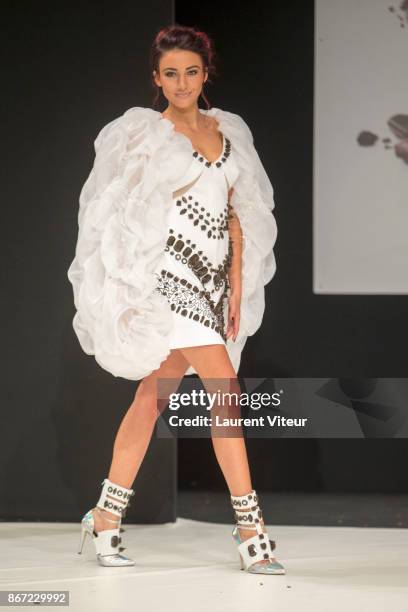 Miss France 2012 Delphine Wespiser walks the Runway during "Le Defile des Robes en Chocolats" during the "Salon du Chocolat Paris 2017" at Parc des...