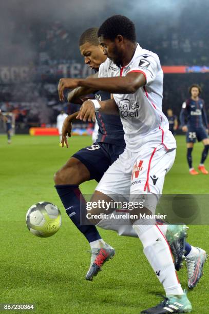 Kylian Mbappe of Paris Saint-Germain and Marlon Santos of OGC Nice fight for the ball during the Ligue 1 match between Paris Saint Germain and OGC...