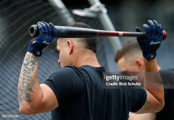 Gary Sanchez of the New York Yankees with his last name tattooed on his arm wearing a Franklin batting glove during batting practice before a game...