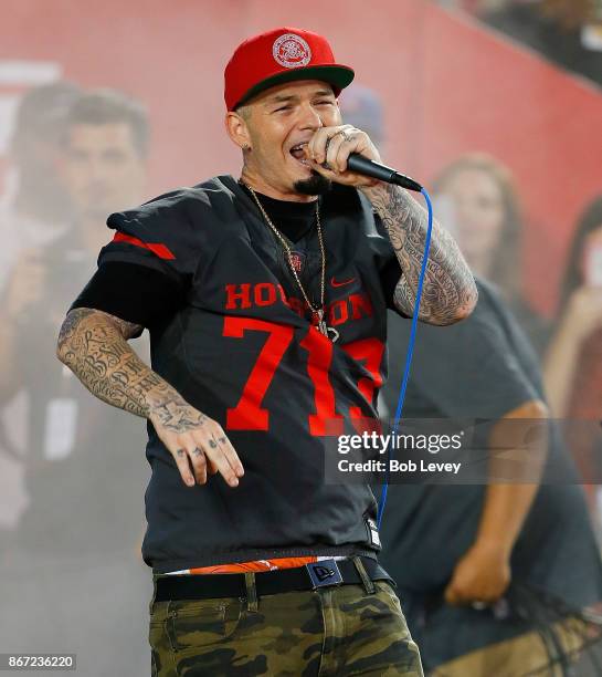 Houston rapper Paul Wall brings the Houston Cougars onto the field against the Memphis Tigers on October 19, 2017 in Houston, Texas.