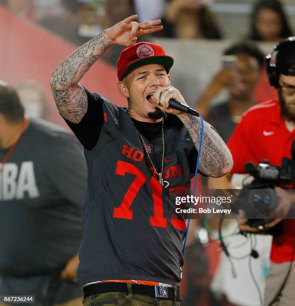 Houston rapper Paul Wall brings the Houston Cougars onto the field against the Memphis Tigers on October 19, 2017 in Houston, Texas.