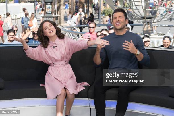Millie Bobby Brown and Mark Wright visit "Extra" at Universal Studios Hollywood on October 27, 2017 in Universal City, California.