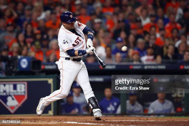 Yuli Gurriel of the Houston Astros hits a solo home run during the second inning against the Los Angeles Dodgers in game three of the 2017 World...