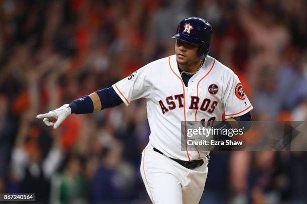 Yuli Gurriel of the Houston Astros reacts after hitting a solo home run during the second inning against the Los Angeles Dodgers in game three of the...