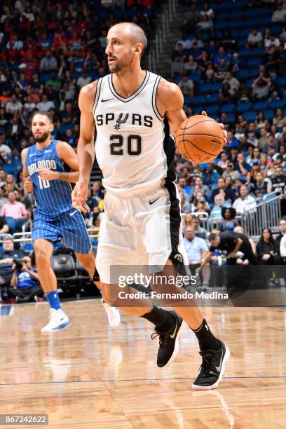 Manu Ginobili of the San Antonio Spurs handles the ball against the Orlando Magic on October 27, 2017 at Amway Center in Orlando, Florida. NOTE TO...