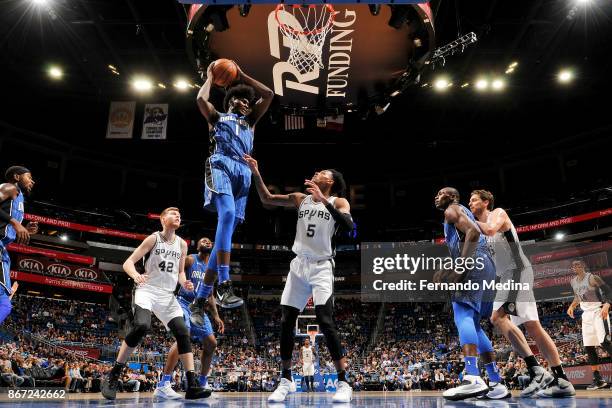 Jonathan Isaac of the Orlando Magic handles the ball against the San Antonio Spurs on October 27, 2017 at Amway Center in Orlando, Florida. NOTE TO...