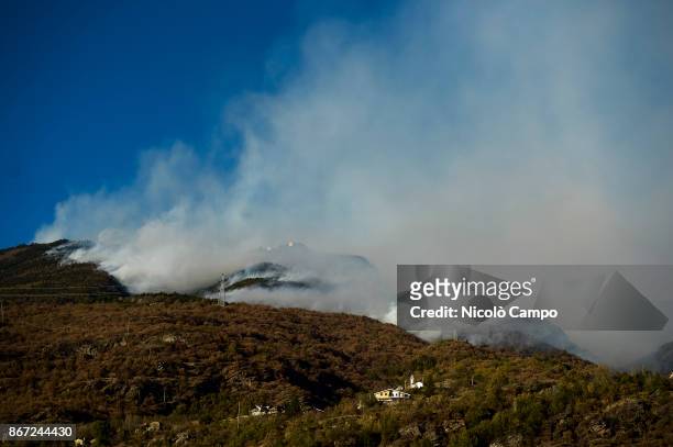 Fire burns in a mountain of the Susa Valley near Turin. The fires have been burning for several days favored by strong wind and drought, so smoke has...