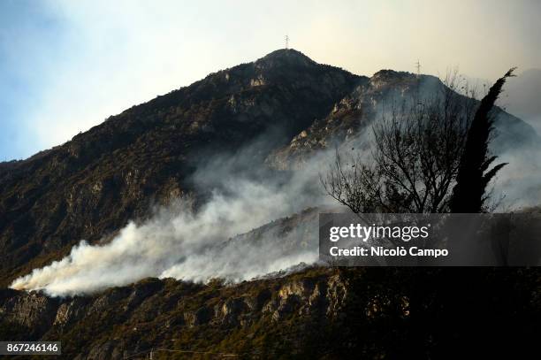 Fire burns in a mountain of the Susa Valley near Turin. The fires have been burning for several days favored by strong wind and drought, so smoke has...