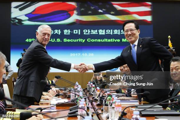 Secretary of Defense James Mattis shakes hands with South Korean Defense Minister Song Young-moo during the 49th Security Consultative Meeting at...