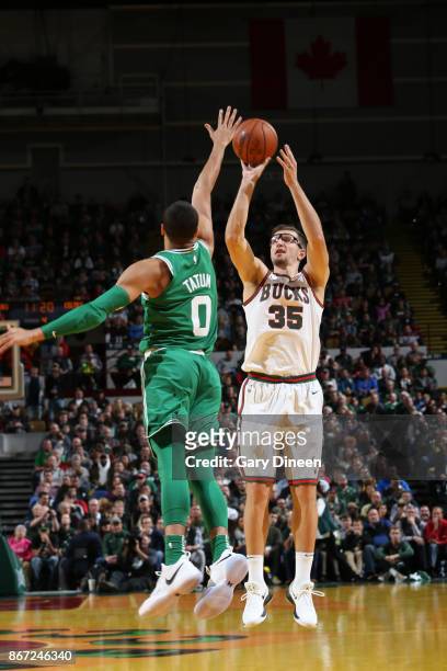 Milwaukee, WI Mirza Teletovic of the Milwaukee Bucks shoots the ball during the game against the Boston Celtics on October 26, 2017 at the...
