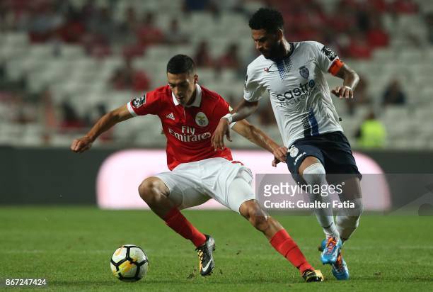 Benfica forward Raul Jimenez from Mexico with CD Feirense midfielder Babanco from Cape Verde in action during the Primeira Liga match between SL...