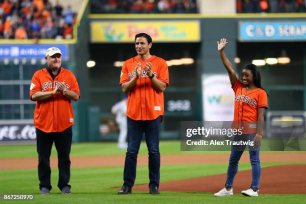 Astronaut Scott Kelly, Houston Dynamo legend Brian Ching and gold medal Olympian Simone Biles are introduced during the pre-game ceremony prior to...