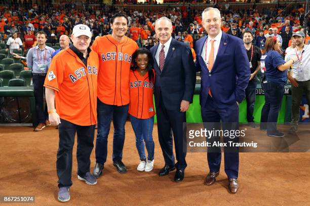 Astronaut Scott Kelly, Houston Dynamo legend Brian Ching and gold medal Olympian Simone Biles pose for a photo with Major League Baseball...
