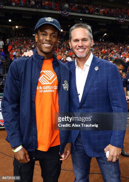 Christian Tilly from the Boys & Girls Clubs of Greater Houston Stafford Club and Hall of Famer and former Astros player Craig Biggio pose for a photo...