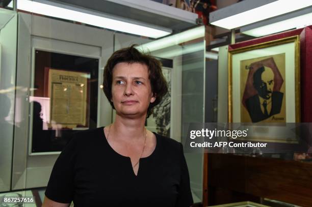 Picture taken on September 20, 2017 shows the Lenin Memorial museum director Lidiya Larina posing among exhibits during an AFP interview in...