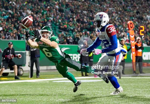 Rob Bagg of the Saskatchewan Roughriders just misses making a diving catch in the end zone behind the coverage of Tevaughn Campbell in the first half...