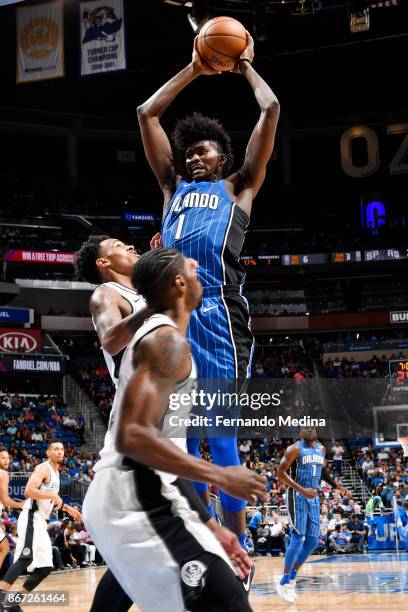 Jonathan Isaac of the Orlando Magic handles the ball against the San Antonio Spurs on October 27, 2017 at Amway Center in Orlando, Florida. NOTE TO...