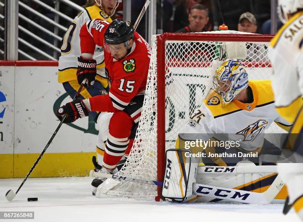 Artem Anisimov of the Chicago Blackhawks shoots against Pekka Rinne of the Nashville Predators at the United Center on October 27, 2017 in Chicago,...