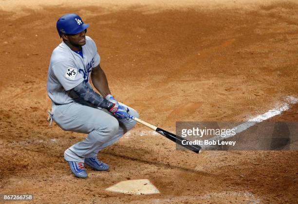 Yasiel Puig of the Los Angeles Dodgers reacts after striking out during the ninth inning against the Houston Astros in game three of the 2017 World...