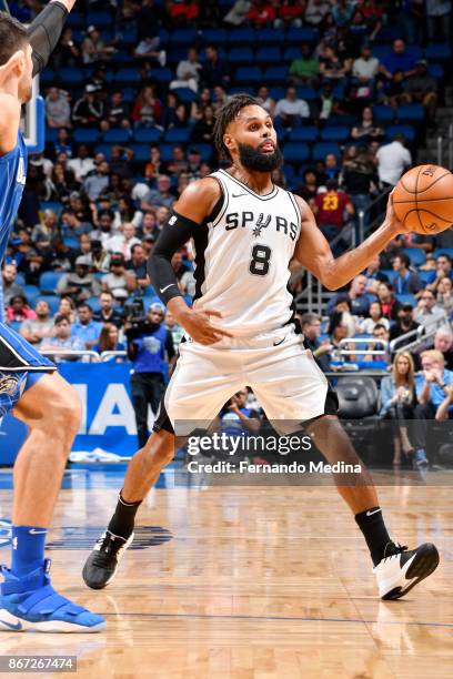 Patty Mills of the San Antonio Spurs passes the ball against the Orlando Magic on October 27, 2017 at Amway Center in Orlando, Florida. NOTE TO USER:...