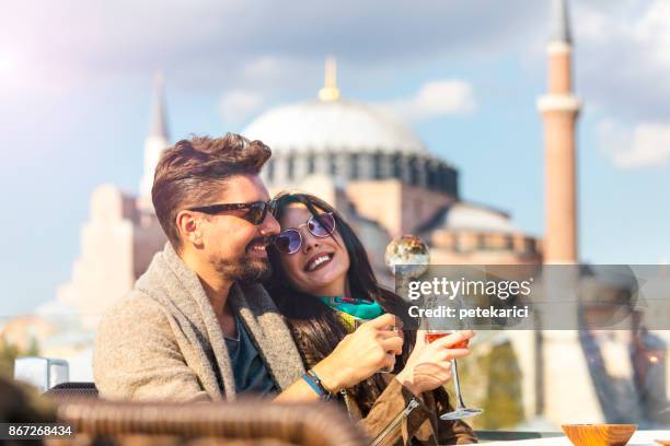 toast, à votre santé ! - turkish couple photos et images de collection