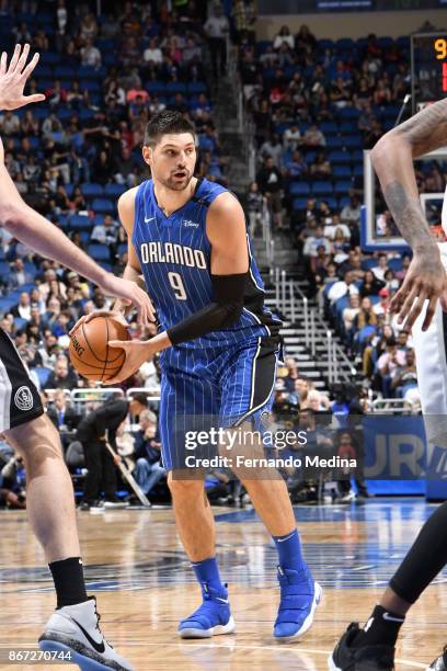 Nikola Vucevic of the Orlando Magic handles the ball against the San Antonio Spurs on October 27, 2017 at Amway Center in Orlando, Florida. NOTE TO...