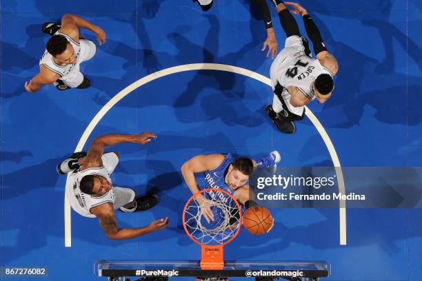 Nikola Vucevic of the Orlando Magic drives to the basket against the San Antonio Spurs on October 27, 2017 at Amway Center in Orlando, Florida. NOTE...