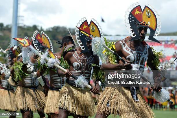 Traditional Papua New Guinean dancers perform before the Rugby League World Cup match between Papua New Guinea and Wales at Oil Search National...