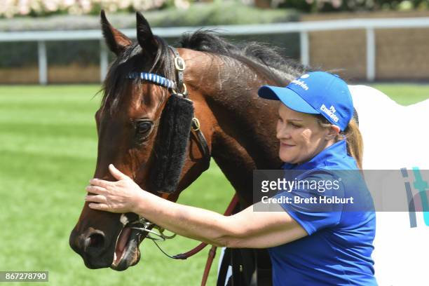 Banish with strapper Linda Wilson after winning the italktravel Fillies Classic at Moonee Valley Racecourse on October 28, 2017 in Moonee Ponds,...