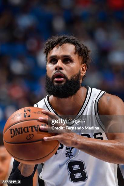 Patty Mills of the San Antonio Spurs shoots the ball against the Orlando Magic on October 27, 2017 at Amway Center in Orlando, Florida. NOTE TO USER:...