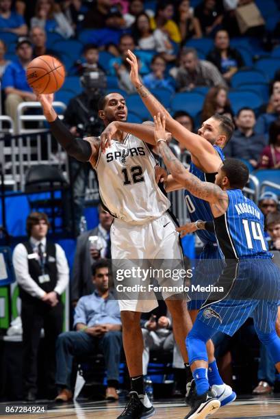 LaMarcus Aldridge of the San Antonio Spurs passes the ball against the Orlando Magic on October 27, 2017 at Amway Center in Orlando, Florida. NOTE TO...