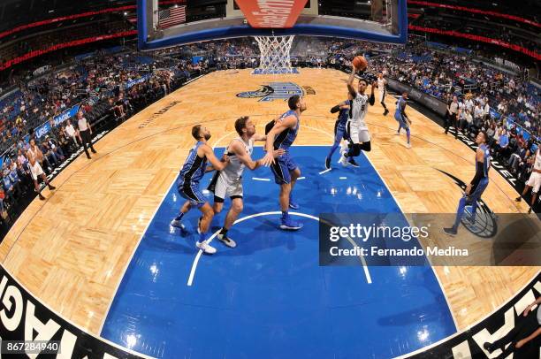 Dejounte Murray of the San Antonio Spurs shoots the ball against the Orlando Magic on October 27, 2017 at Amway Center in Orlando, Florida. NOTE TO...