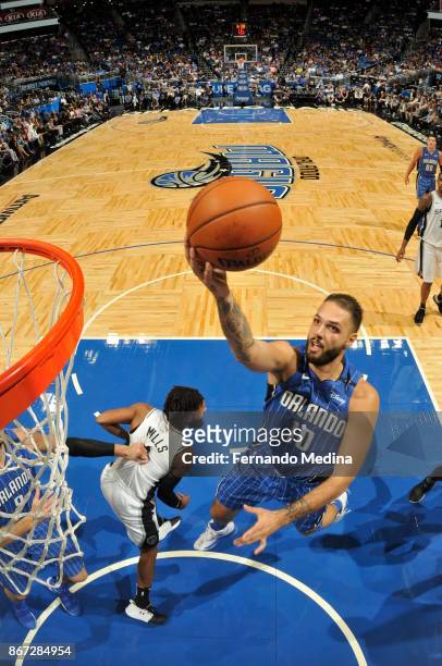 Evan Fournier of the Orlando Magic drives to the basket against the San Antonio Spurs on October 27, 2017 at Amway Center in Orlando, Florida. NOTE...