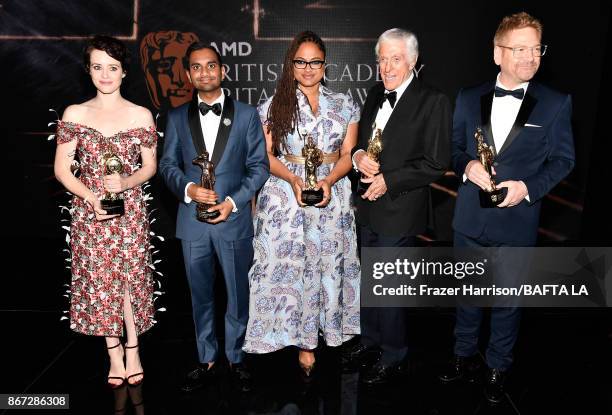 Honorees pose with their awards, Claire Foy with Britannia Award for British Artist of the Year presented by Burberry, Aziz Ansari with Charlie...