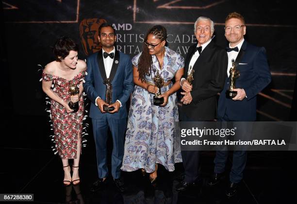 Honorees pose with their awards: Claire Foy with the Britannia Award for British Artist of the Year presented by Burberry, Aziz Ansari with the...