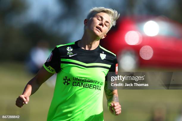 Michelle Heyman of Canberra reacts to missing a goal in the first half during the round one W-League match between Melbourne Victory and Canberra...