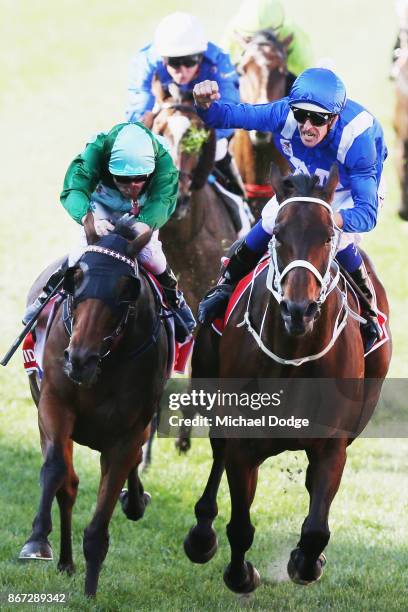 Winx ridden by Hugh Bowman beats Blake Shinn riding Humidor to win race 9 the Ladbrokes Cox Plate during Cox Plate Day at Moonee Valley Racecourse on...