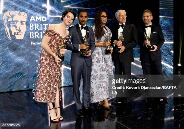 Honorees pose with their awards, Claire Foy with Britannia Award for British Artist of the Year presented by Burberry, Aziz Ansari with Charlie...