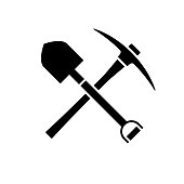 Shovel and pickaxe icon. Black icon isolated on white background.